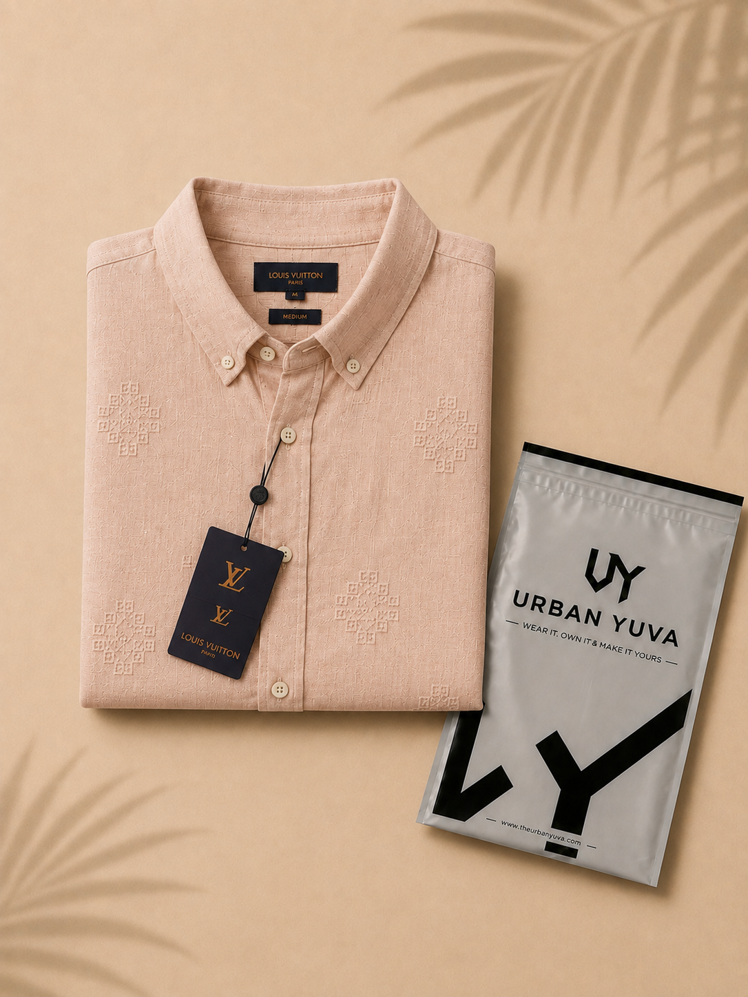 A premium men's peach embroidered blush-pink shirt