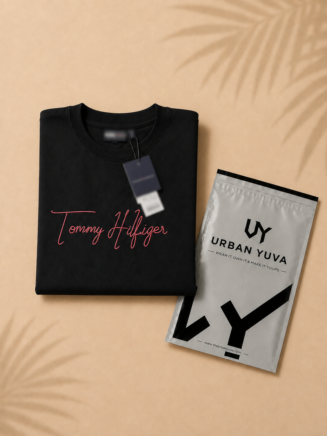 Premium black crew-neck T-shirt featuring a bold graphic print with signature-inspired detailing, perfect for a stylish streetwear look.