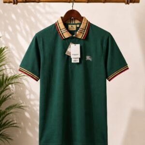 A refined dark green polo T-shirt featuring a classic striped collar and sleeve trims.