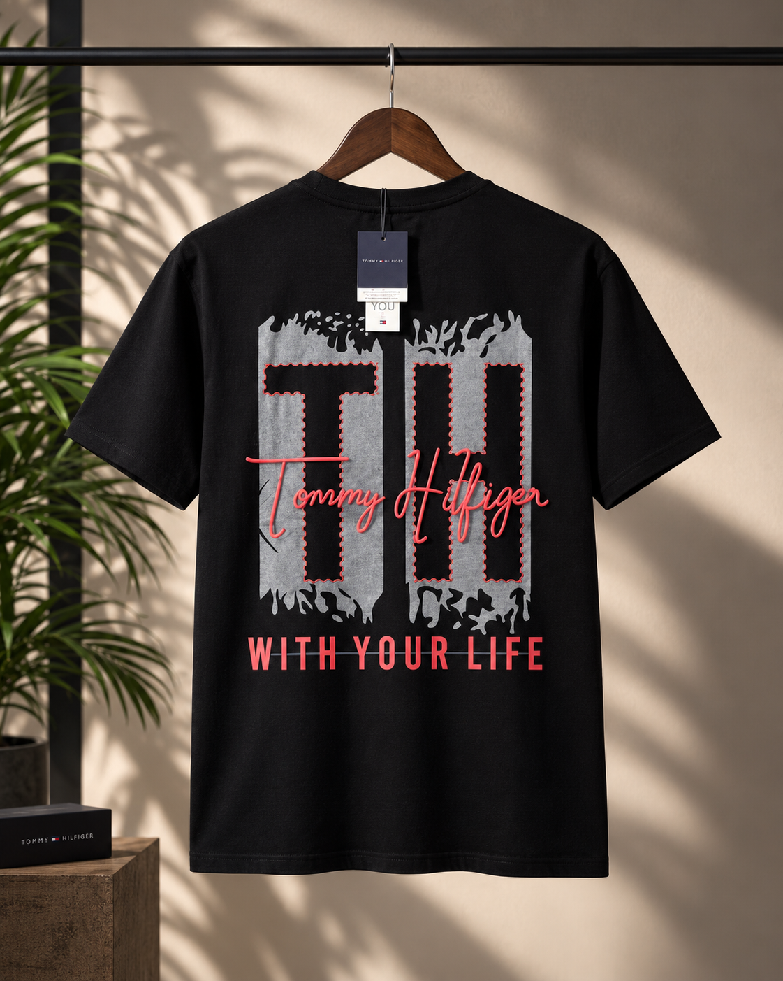 Premium black crew-neck T-shirt featuring a bold graphic print with signature-inspired detailing, perfect for a stylish streetwear look.