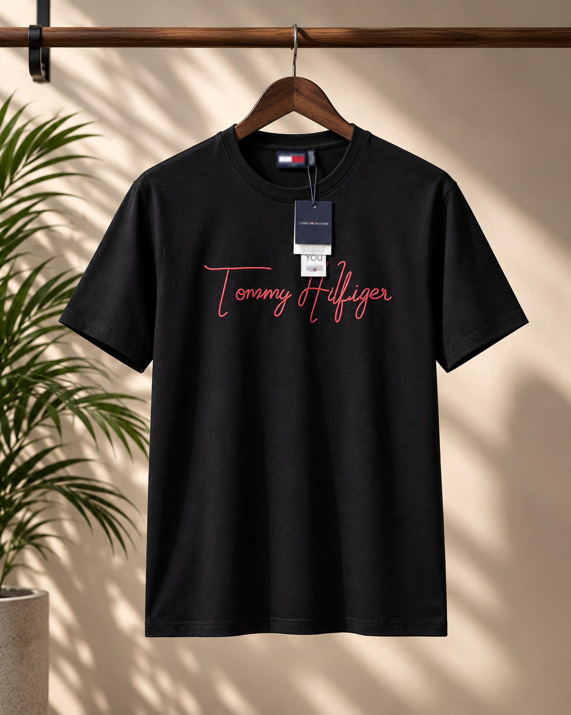 Premium black crew-neck T-shirt featuring a bold graphic print with signature-inspired detailing, perfect for a stylish streetwear look.
