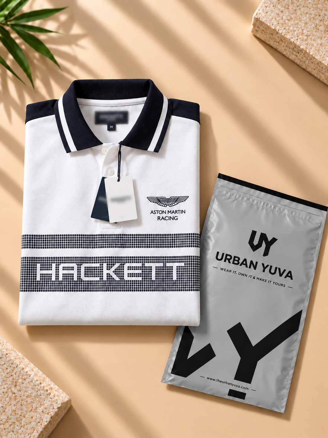 A premium white polo T-shirt featuring navy contrast sleeves .