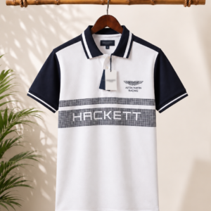 A premium white polo T-shirt featuring navy contrast sleeves .